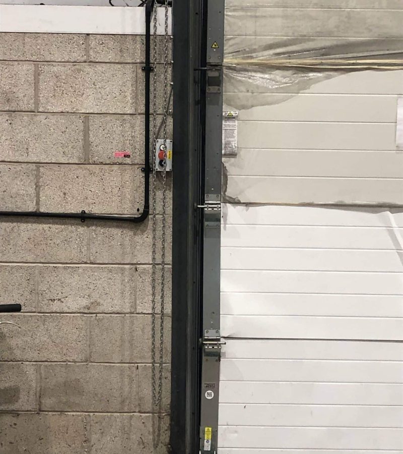 Sectional High Rise Door has been impacted -2