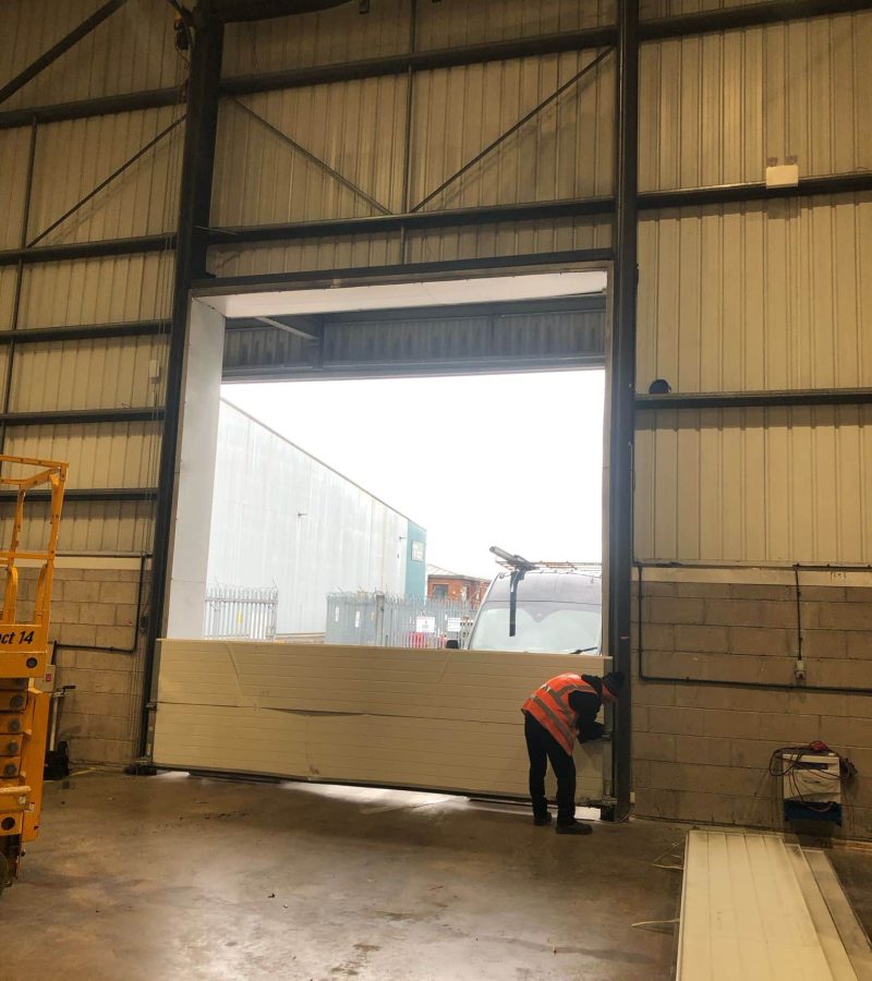 Sectional High Rise Door has been impacted -5