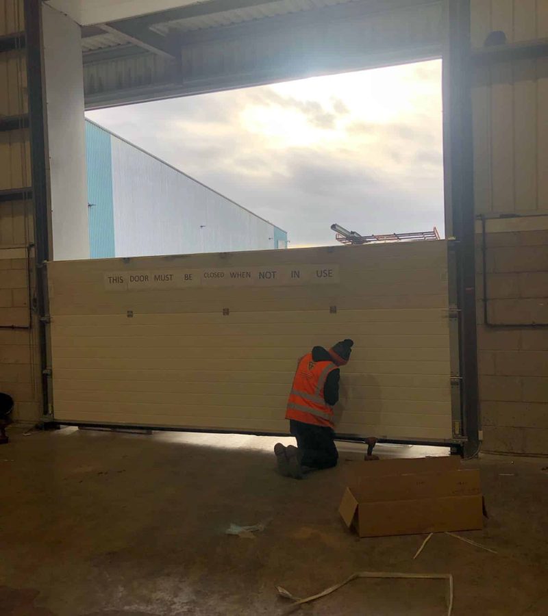 Sectional High Rise Door has been impacted -6